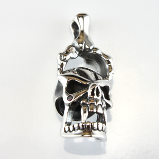 Sterling Silver Skull Pendant with Red Garnet